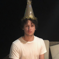 Dylan in a birthday hat
