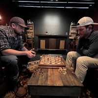 Joe and Mike playing chess at Bonfire HQ
