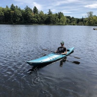 Max kayaking in the lake