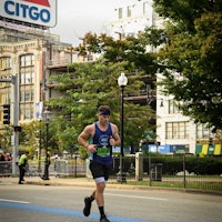 Michael running by the Citgo sign in the Boston Marathon