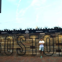 Peter at the Boston sign